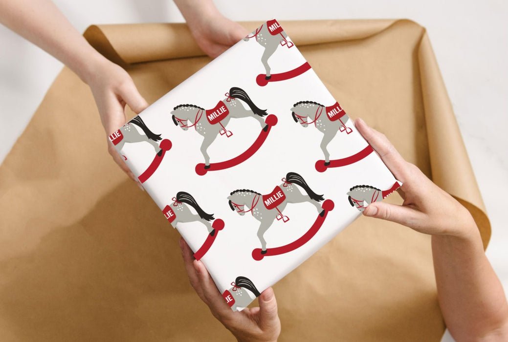 Personalisiertes Weihnachtsschaukelpferd-Packpapier